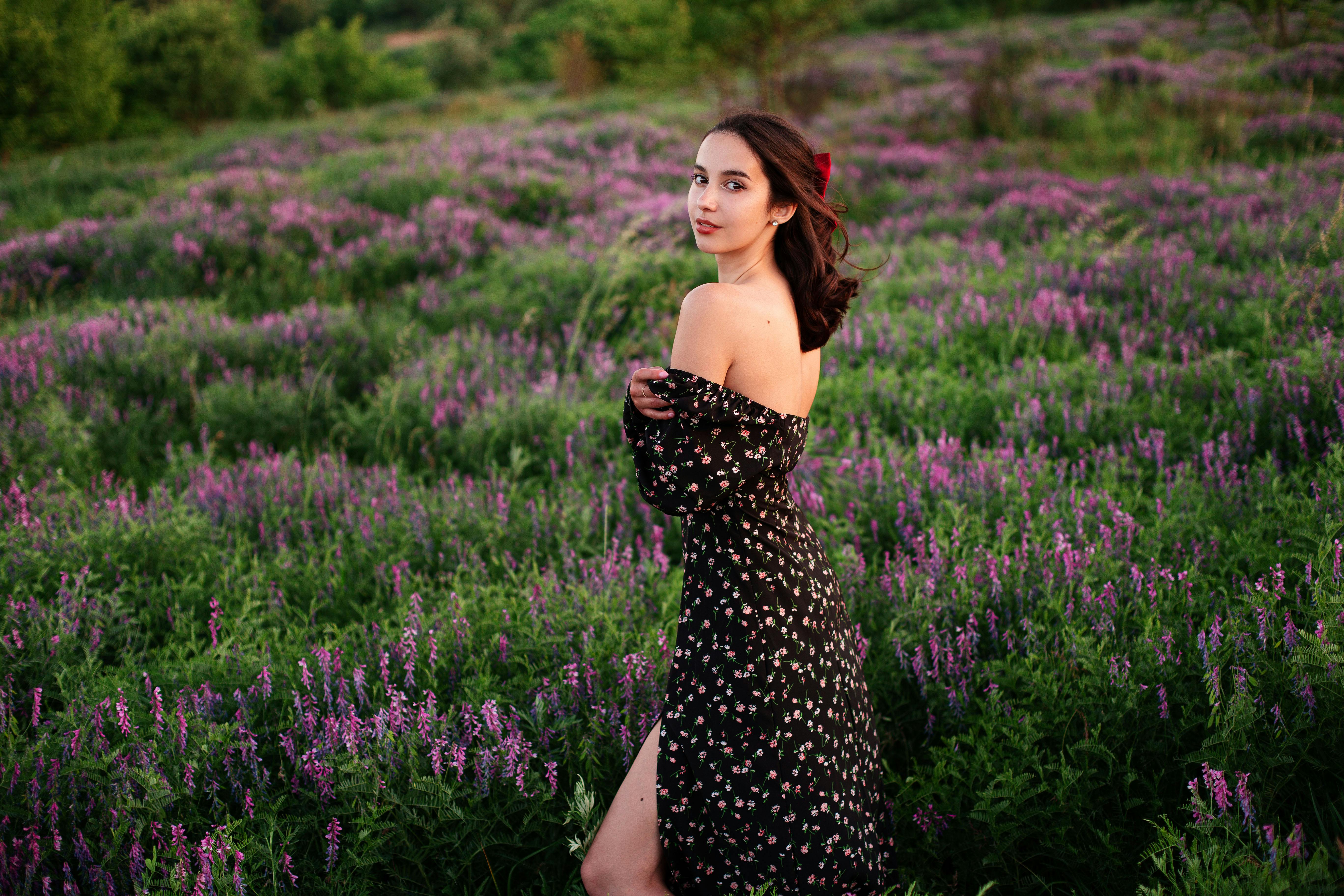 woman in lavender field with off the shoulder dress