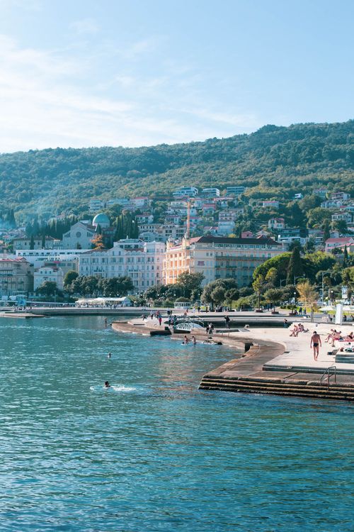 Free Explore the stunning summer coastline of Opatija, Croatia with vibrant landscapes and serene waters. Stock Photo