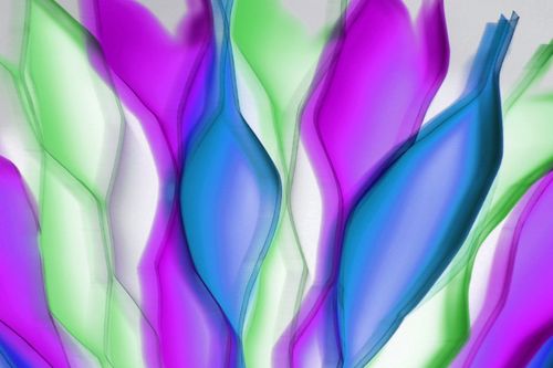 Free Vibrant abstract pattern in purple, blue, and green hues with flowing wave shapes. Stock Photo