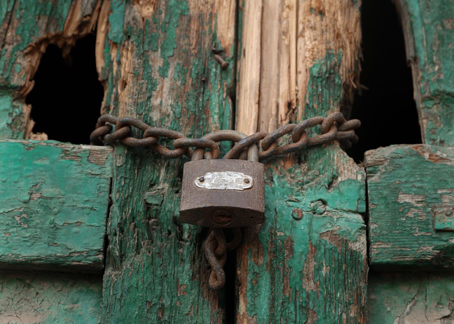 AI brain locked in chains dark room