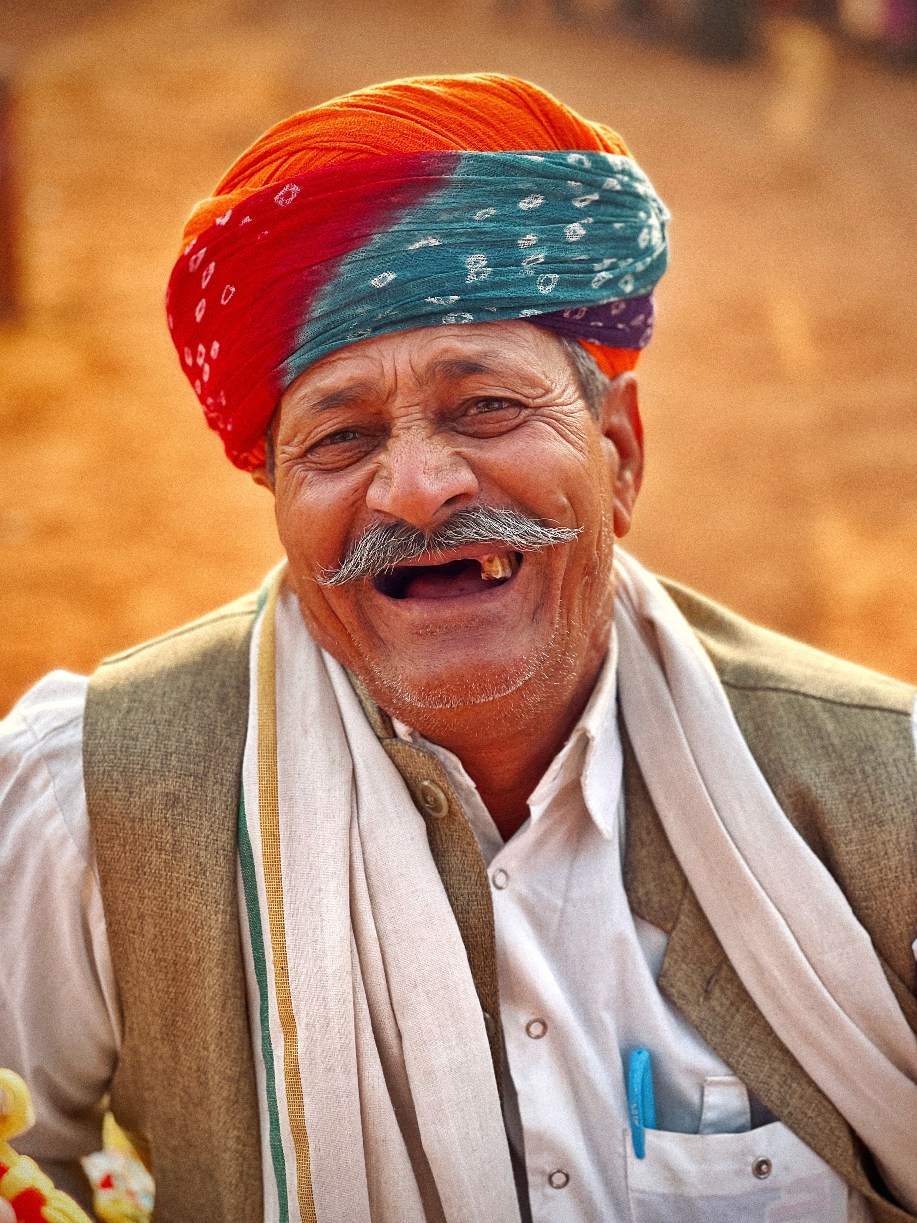 Joyful Elderly Man in Traditional Turban Smiling · Free Stock Photo