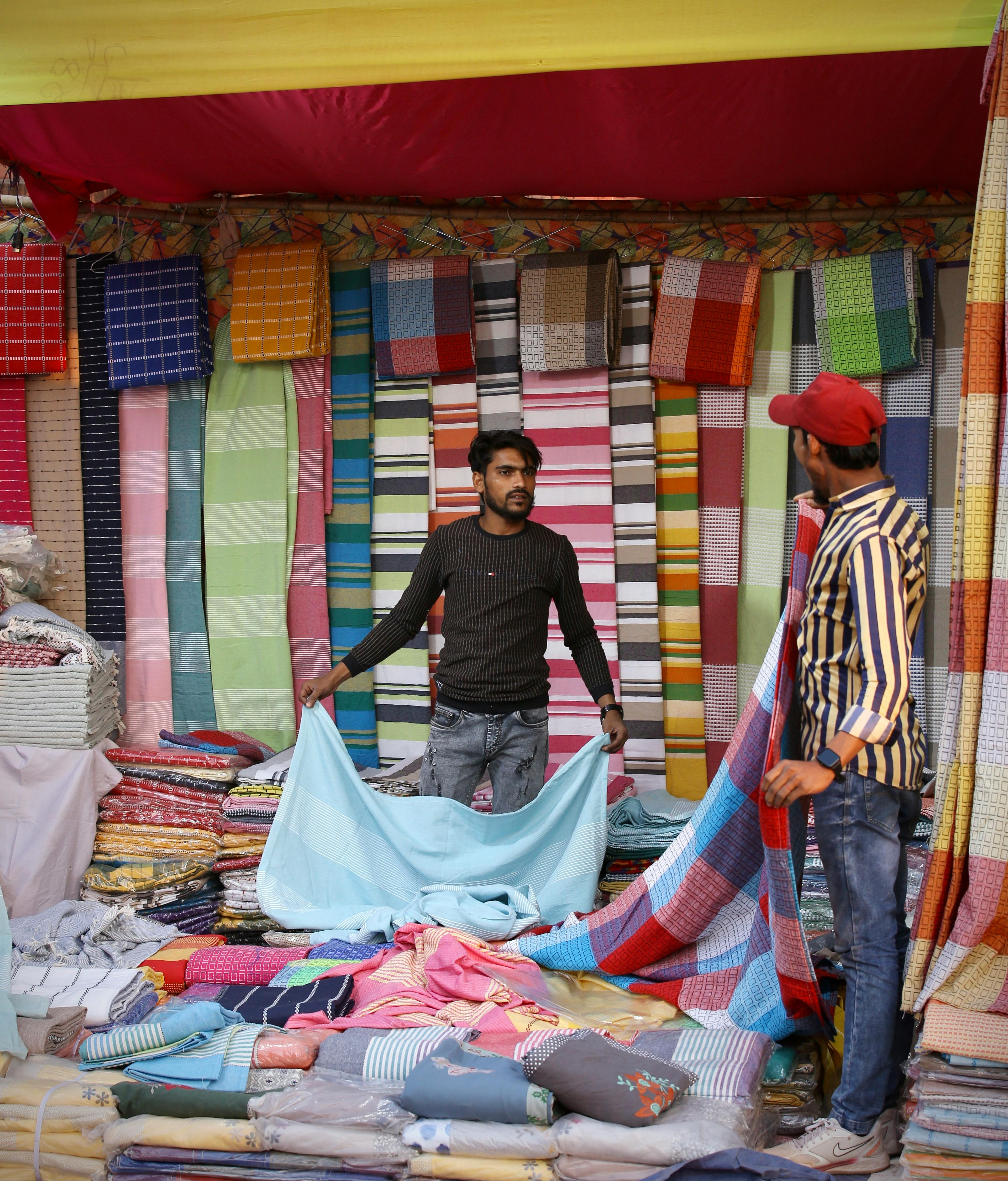 colorful textile market stall with vibrant fabrics