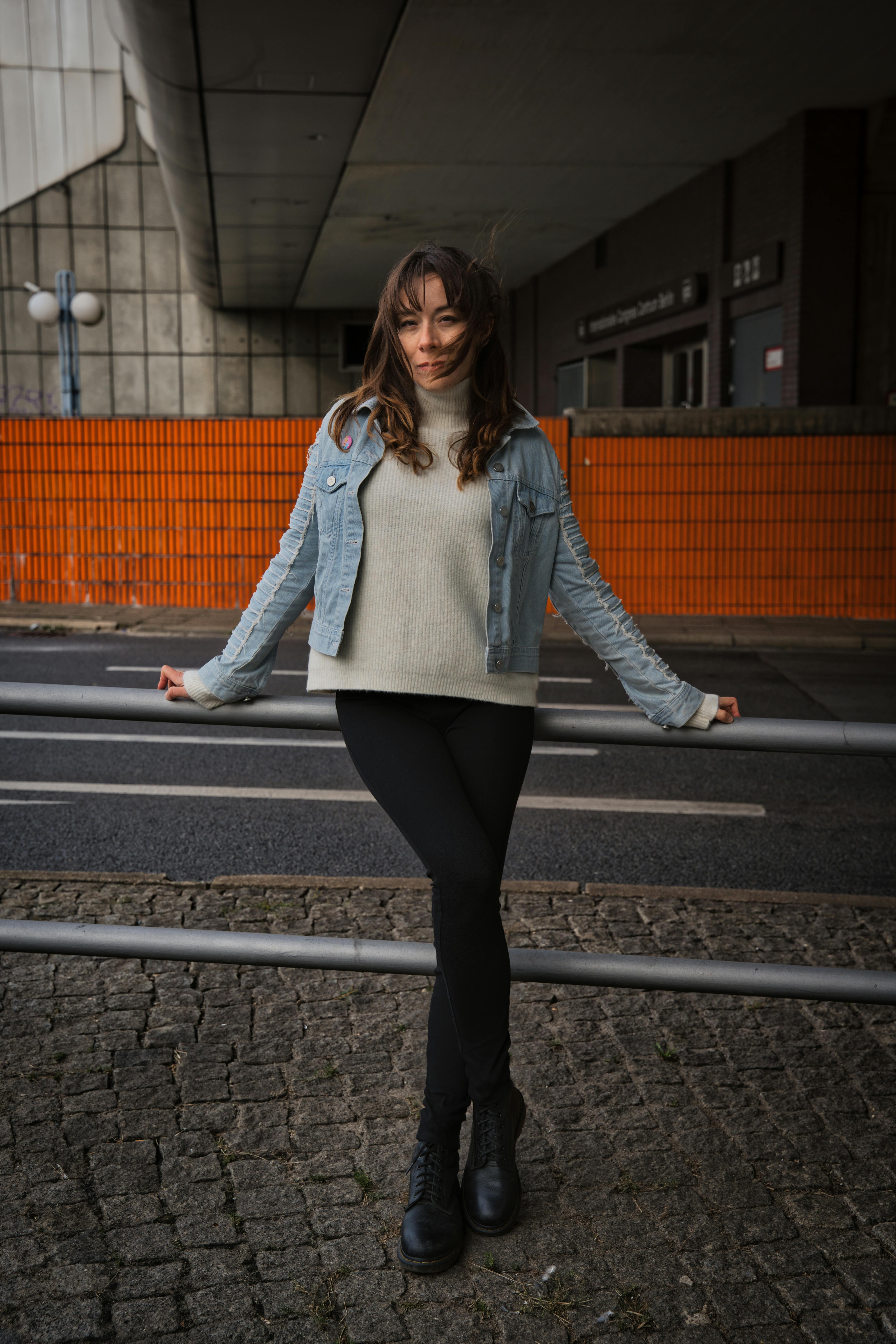 young woman posing in urban berlin street