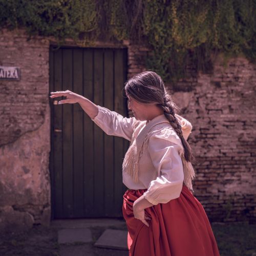 Free Woman in traditional attire performs a dance in Chascomús, Argentina. Stock Photo