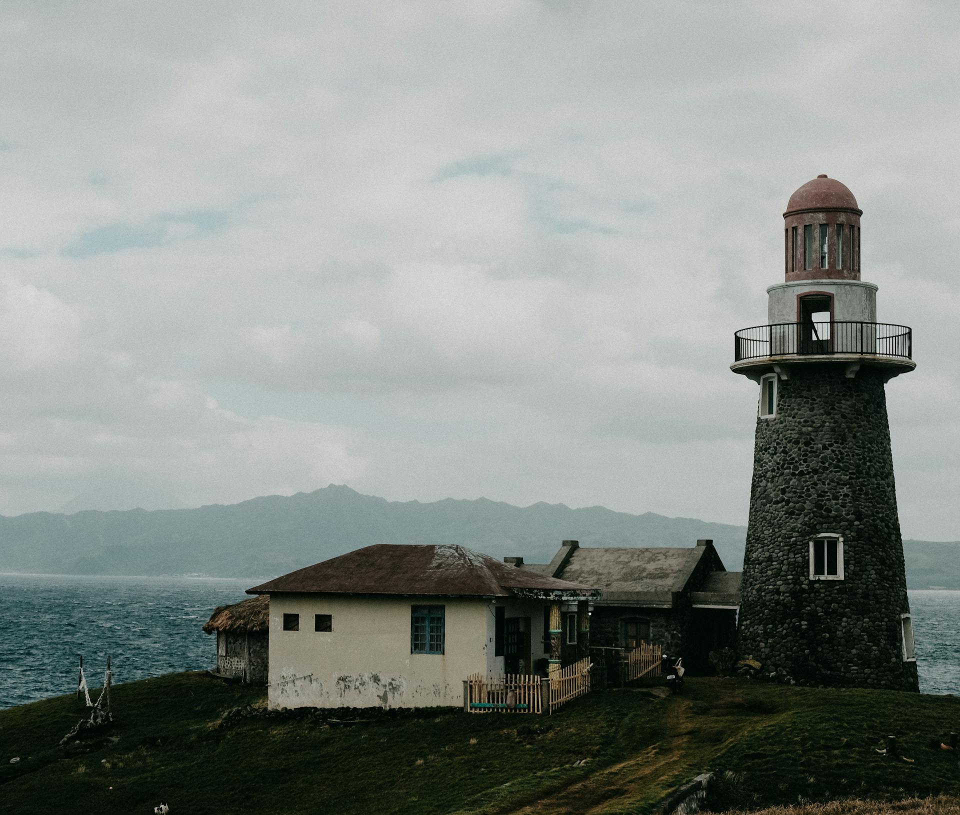 Dramatic lighthouse perched on the coast of Cagayan Valley, Philippines.
