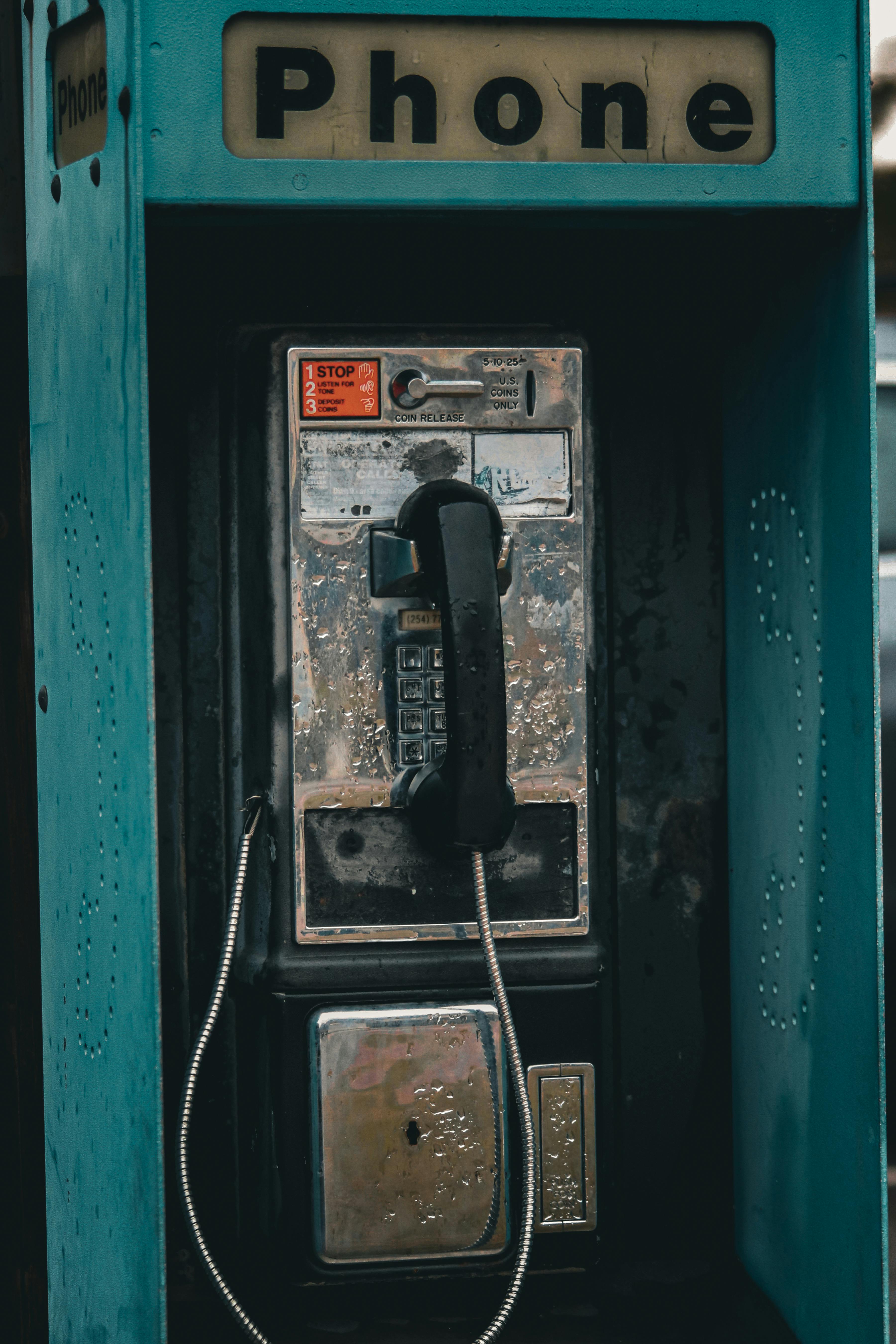 vintage payphone in urban setting