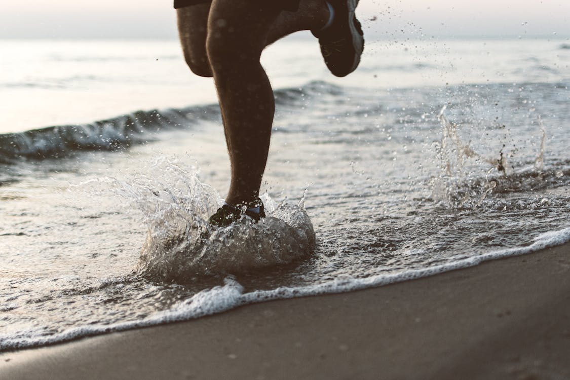Free Person Running At The Beach Stock Photo