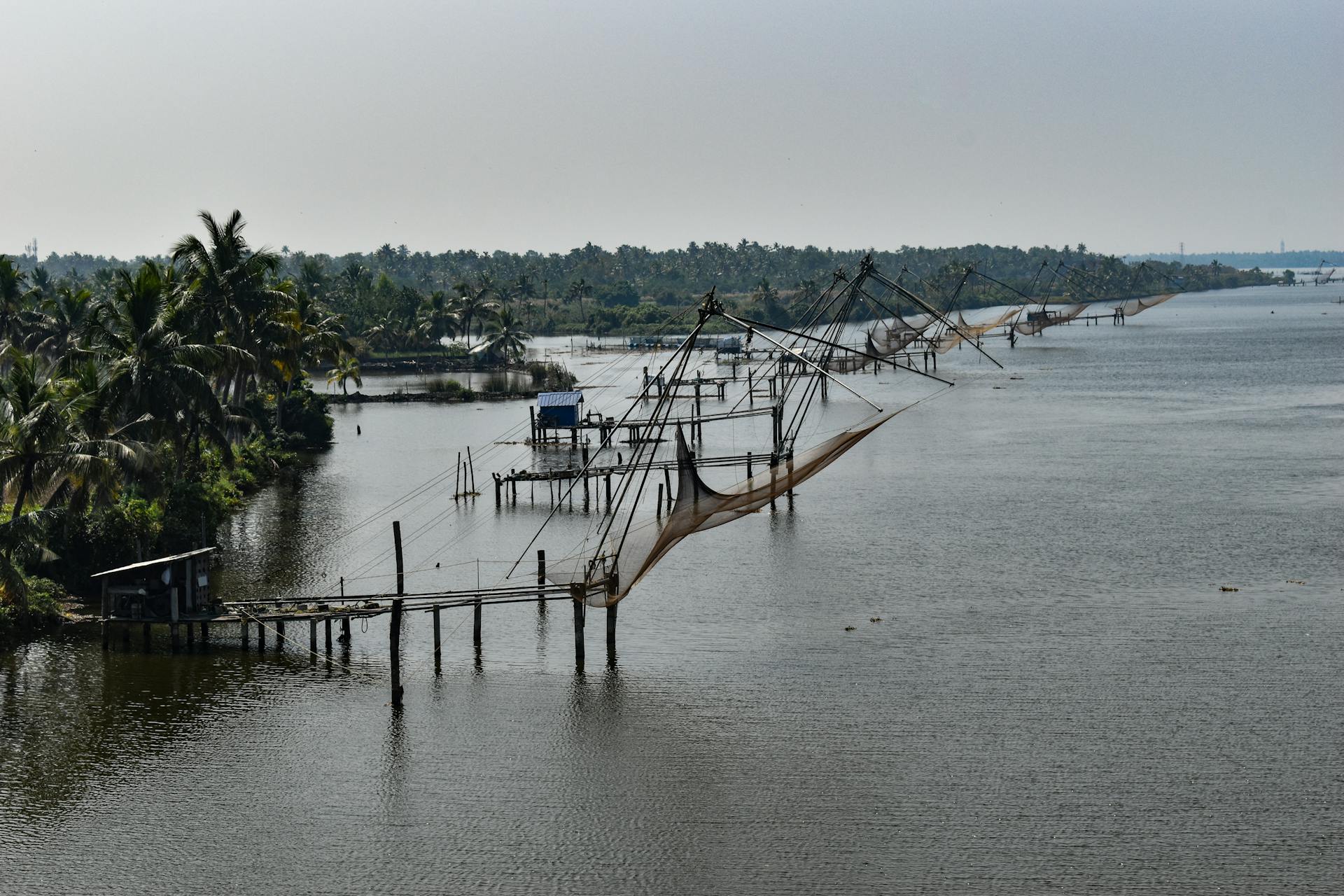 Scenic view of Chinese fishing nets on the backwaters of Kochi, Kerala.