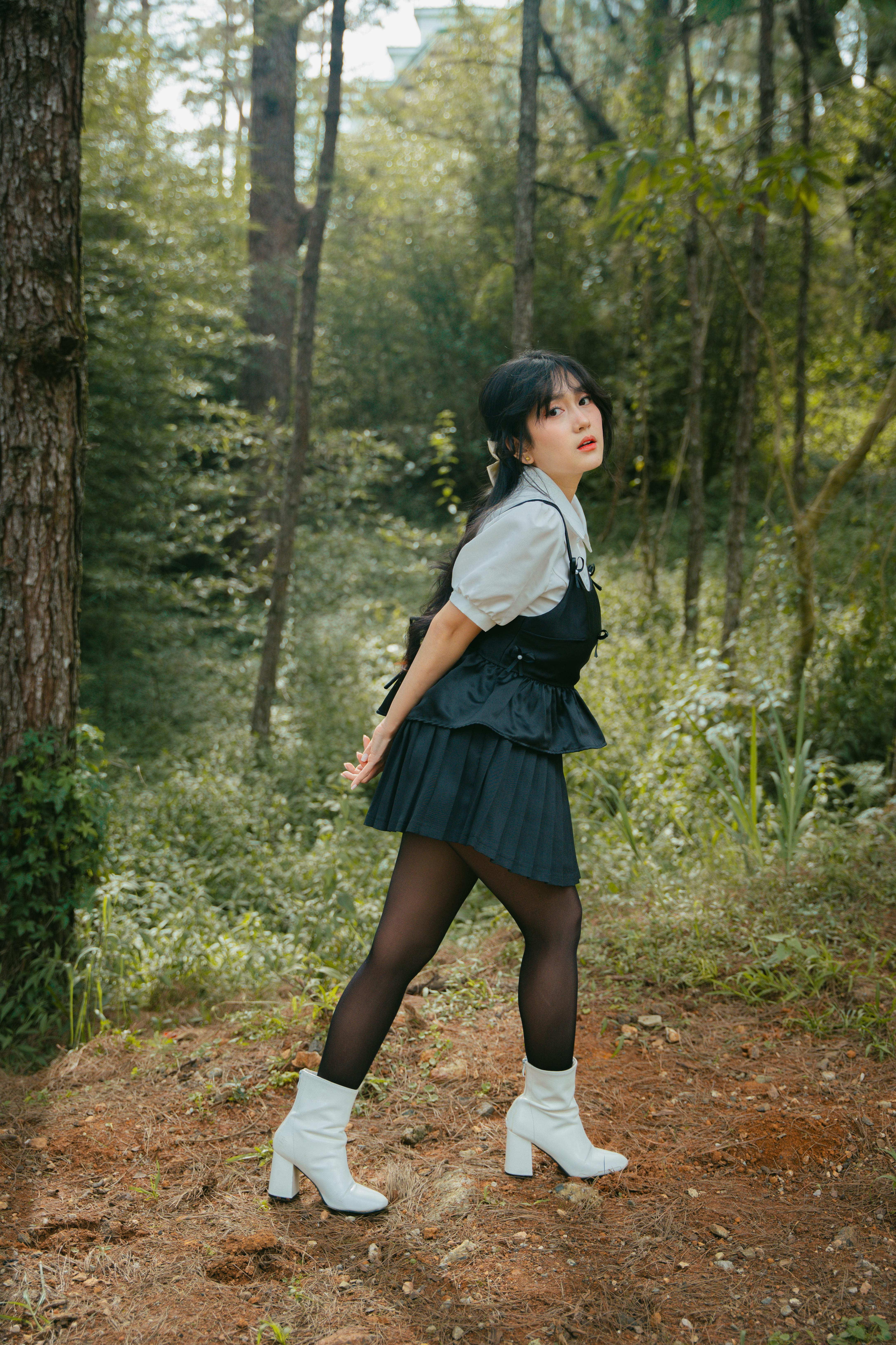 chic fashion portrait in forest setting