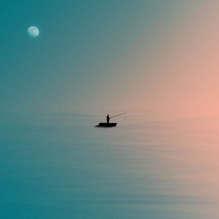 Silhouette Of Man On Boat