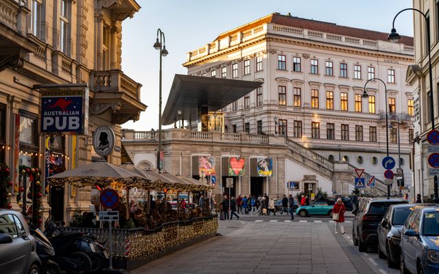 Photo: Vladimir Srajber on Pexels Street view in Vienna featuring the Albertina Museum and a lively pub scene. Perfect mix of culture and leisure.