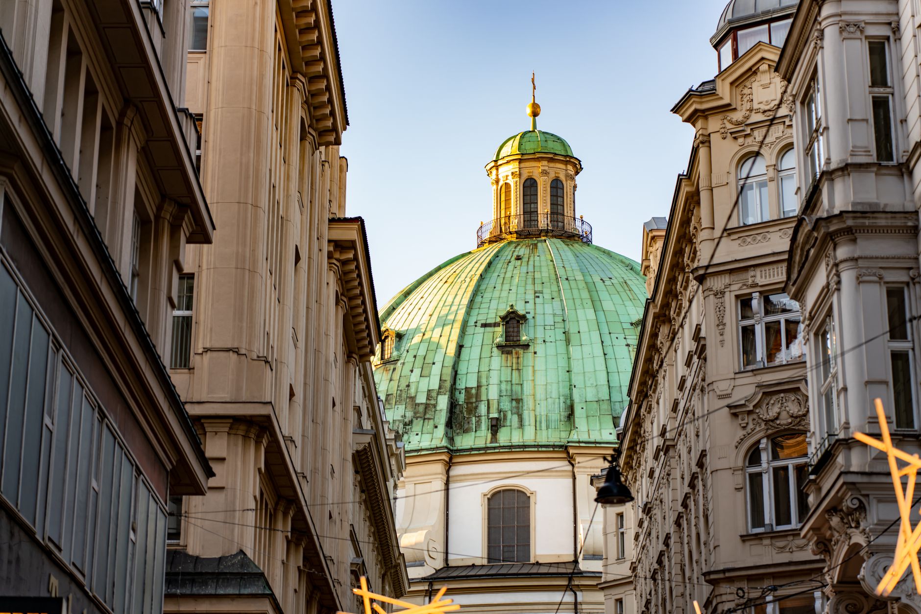 Captivating architectural view of a historic dome in Vienna at sunset.