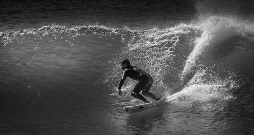 Free Man Playing Surfboarding Stock Photo
