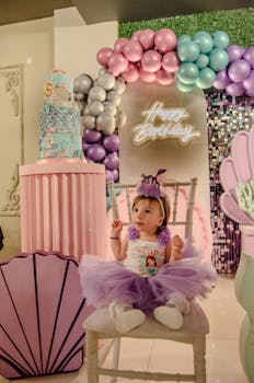 A cute baby celebrates a pastel-themed birthday in Balıkesir, Türkiye.