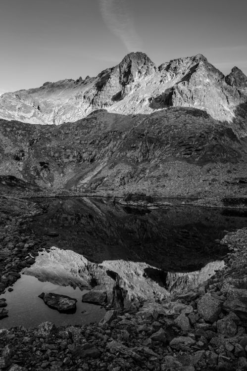 Dramatic Black and White Mountain Landscape Reflection · Free Stock Photo