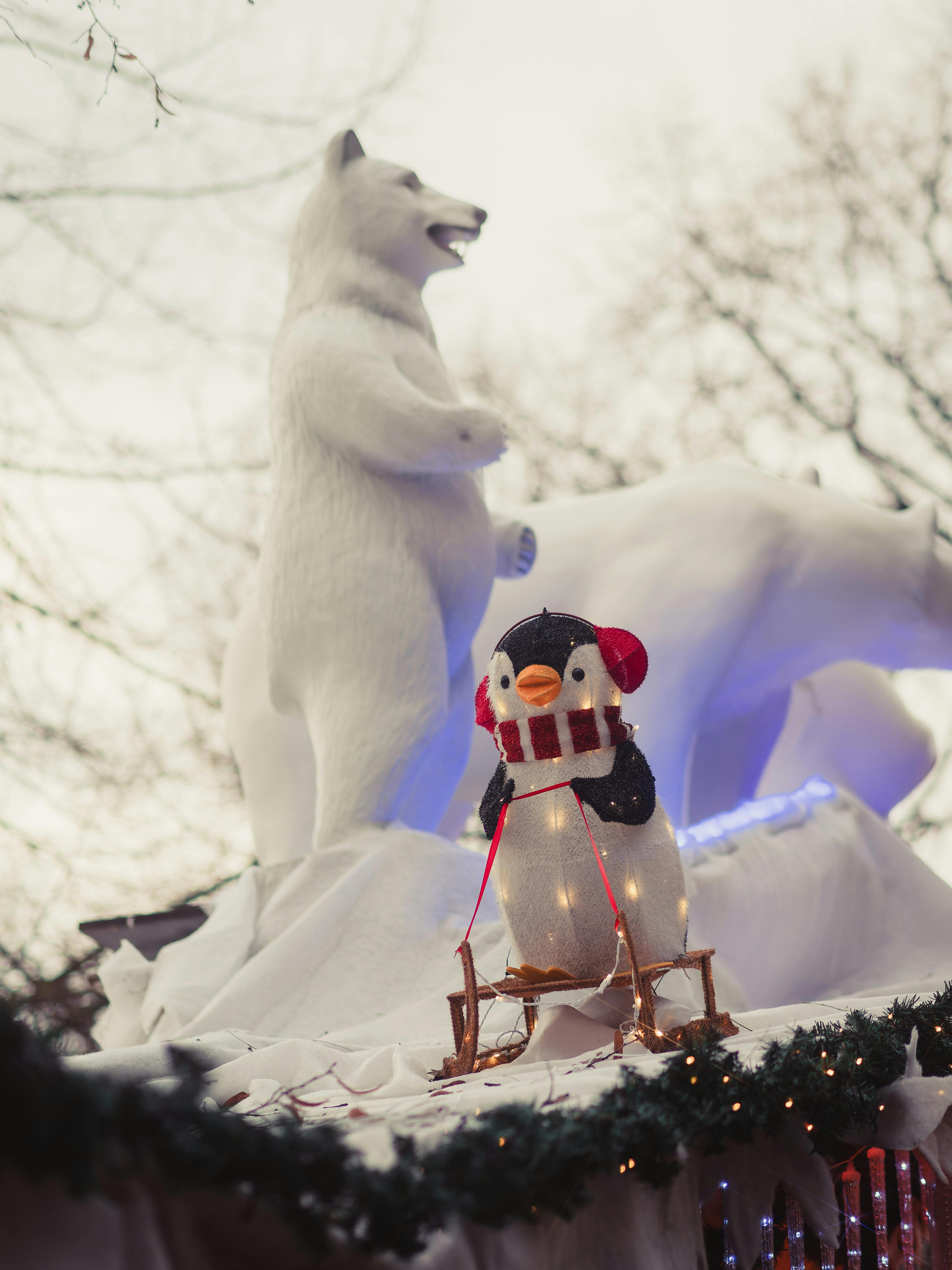 festive polar bear and penguin winter display