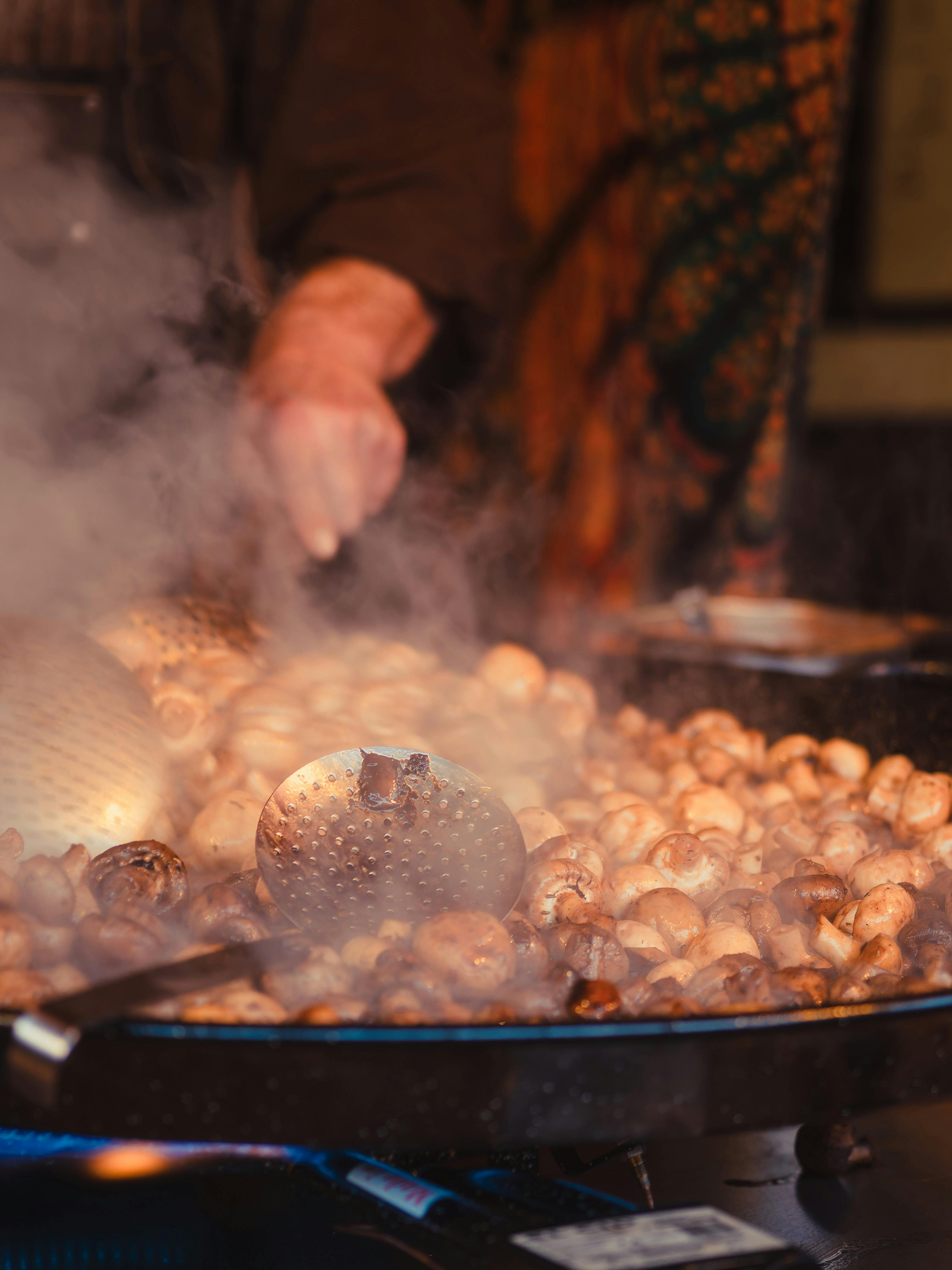 steaming mushrooms at festive christmas market