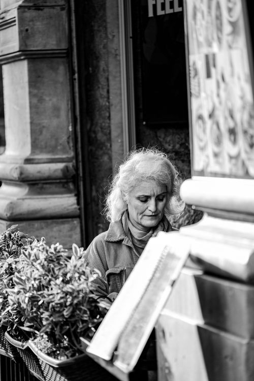 Free A monochrome portrait of a thoughtful woman in a vibrant İstanbul street capturing urban life's essence. Stock Photo