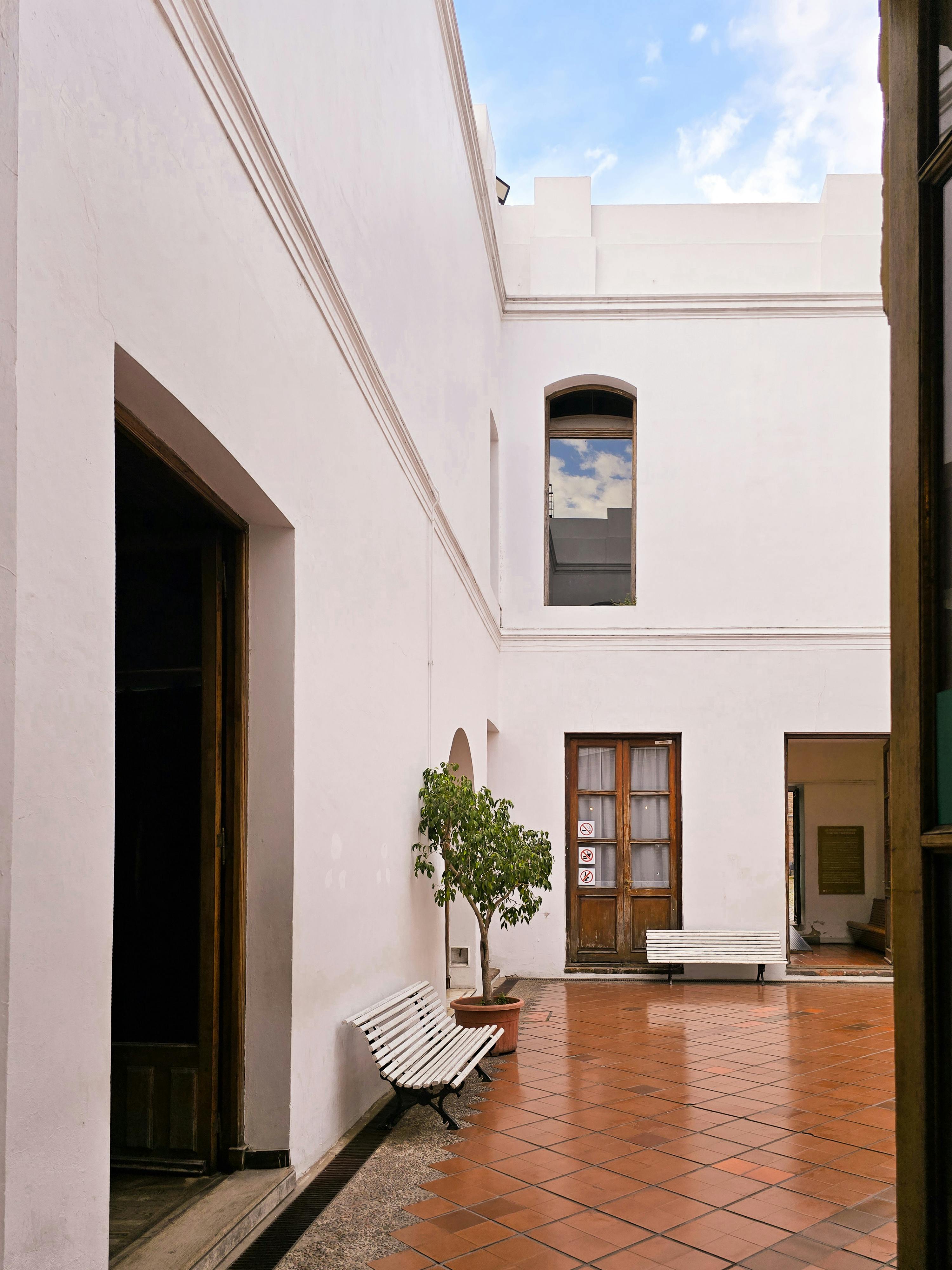 Elegant colonial courtyard in Buenos Aires showcasing classic architecture and serene ambiance.