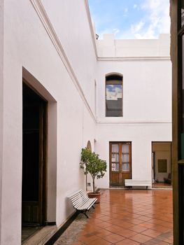 Elegant colonial courtyard in Buenos Aires showcasing classic architecture and serene ambiance.