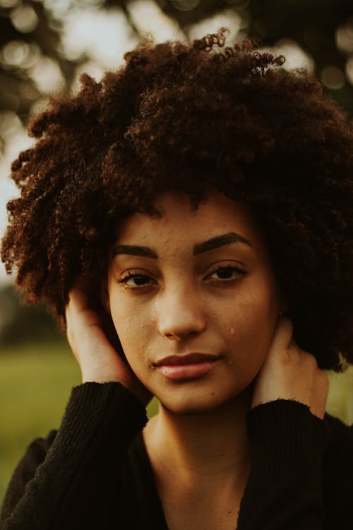 Woman Wearing Black Long Sleeved Shirt