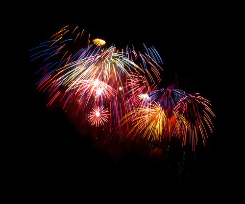 Free Colorful fireworks burst over the Malta night sky during a festive celebration. Stock Photo
