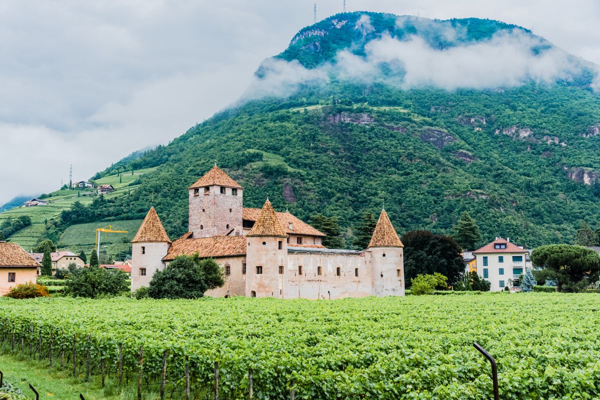 Historic castle in Trentino-South Tyrol surrounded by greenery and mountains