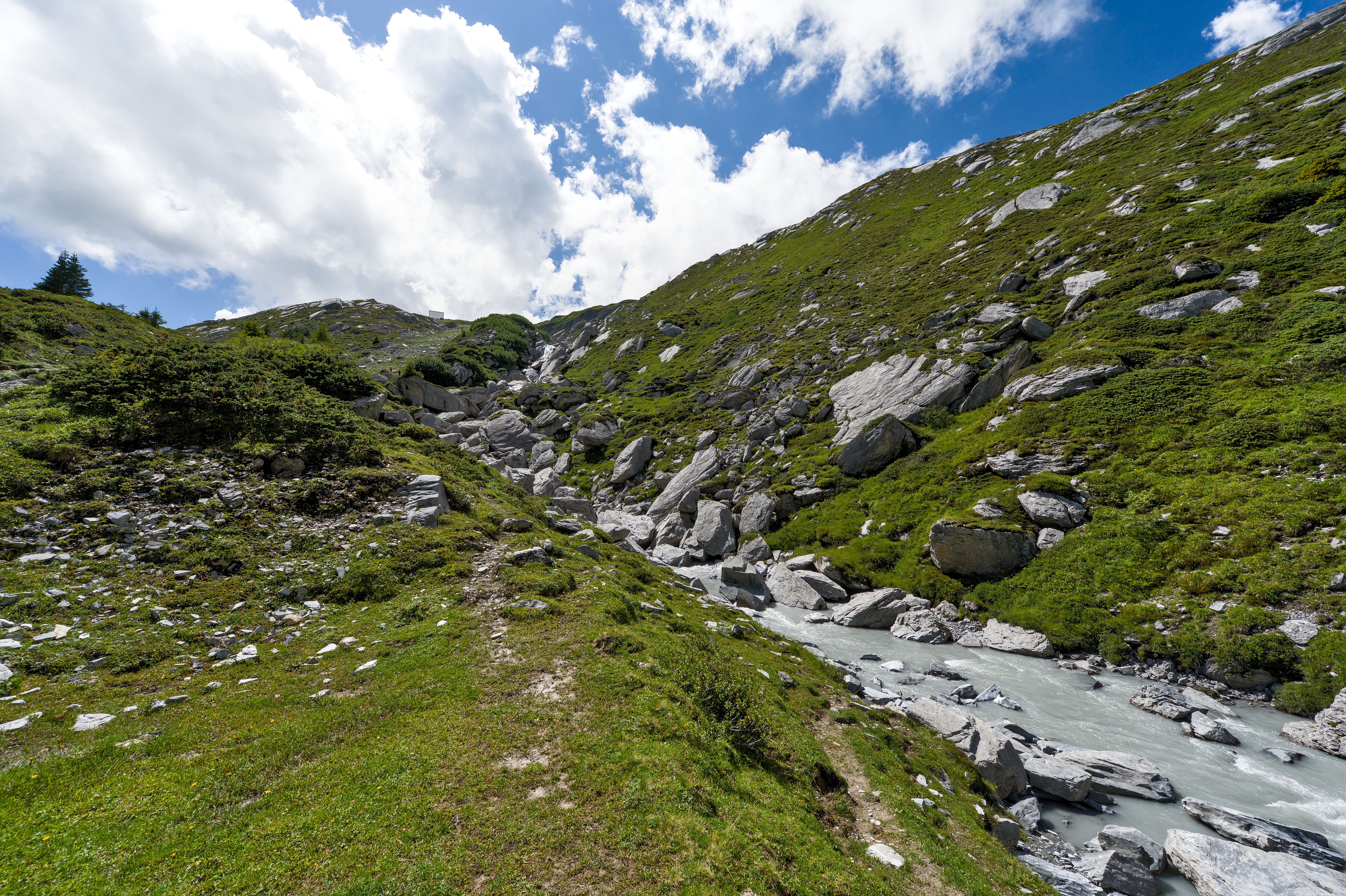 Scenic Alpine Landscape with Rocky Stream · Free Stock Photo