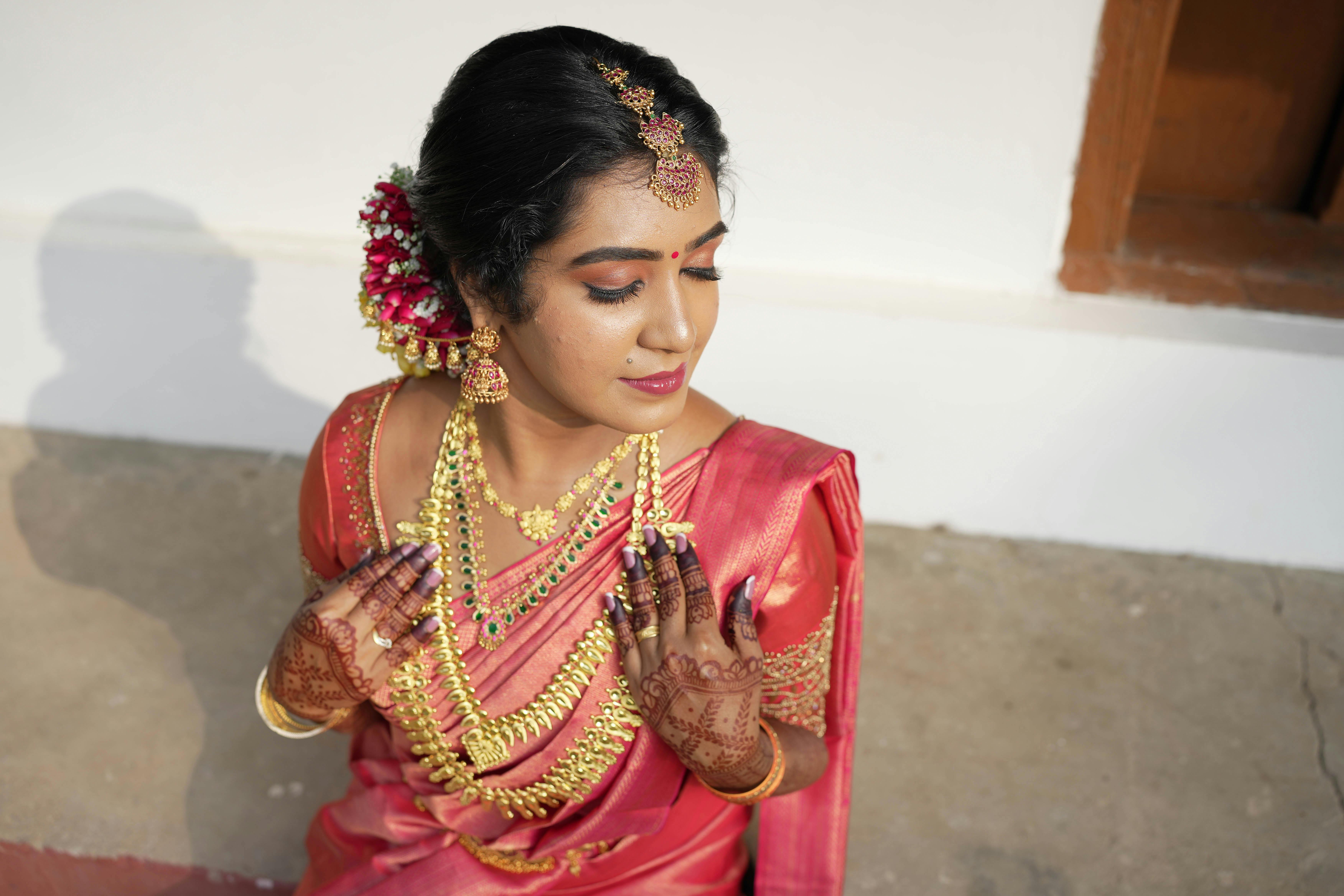 traditional indian bride in pink saree