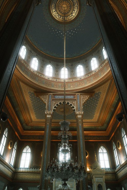 Free Intricate architectural details of a historic building interior with chandeliers. Stock Photo