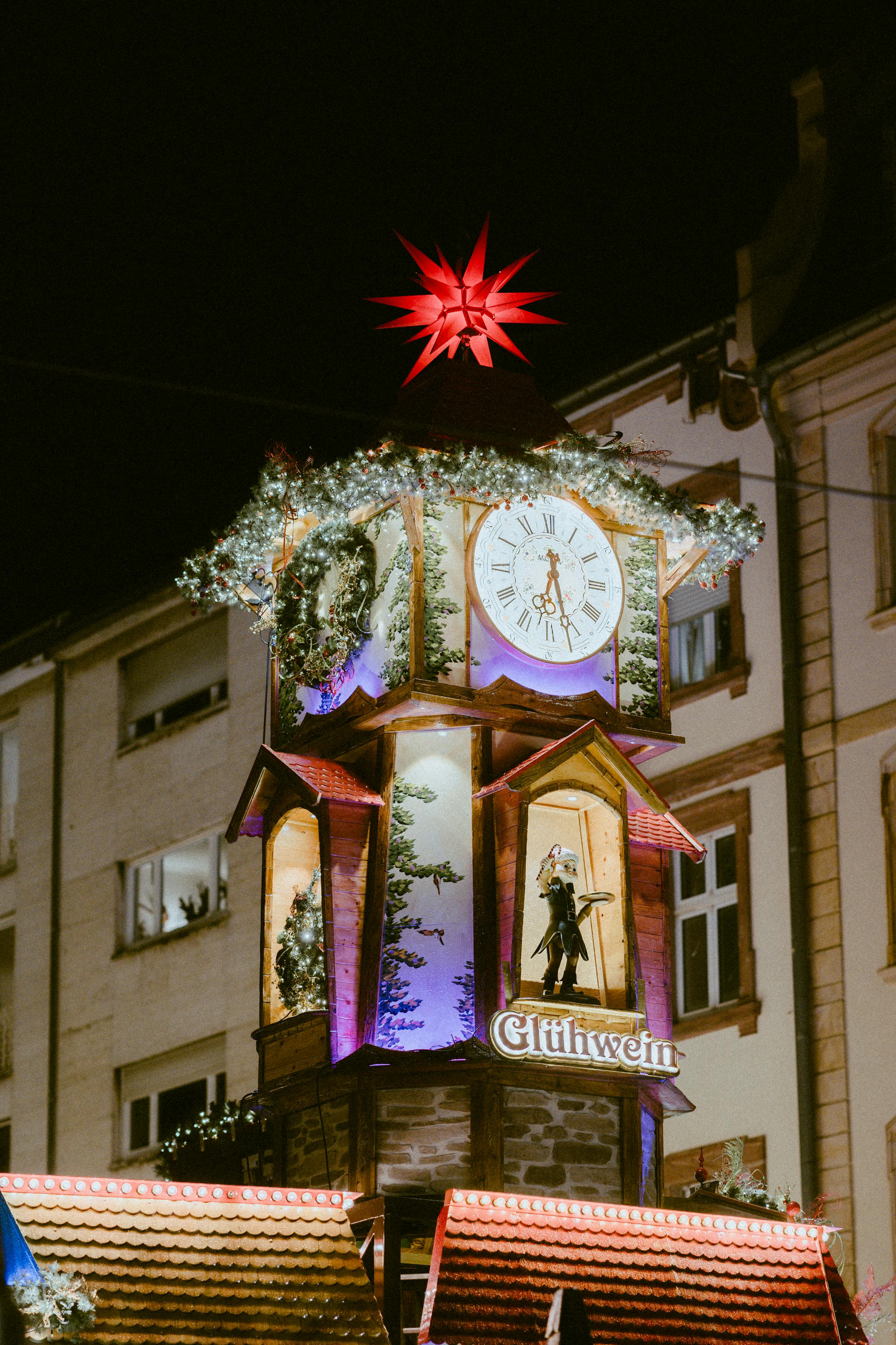 festive christmas clock tower at night