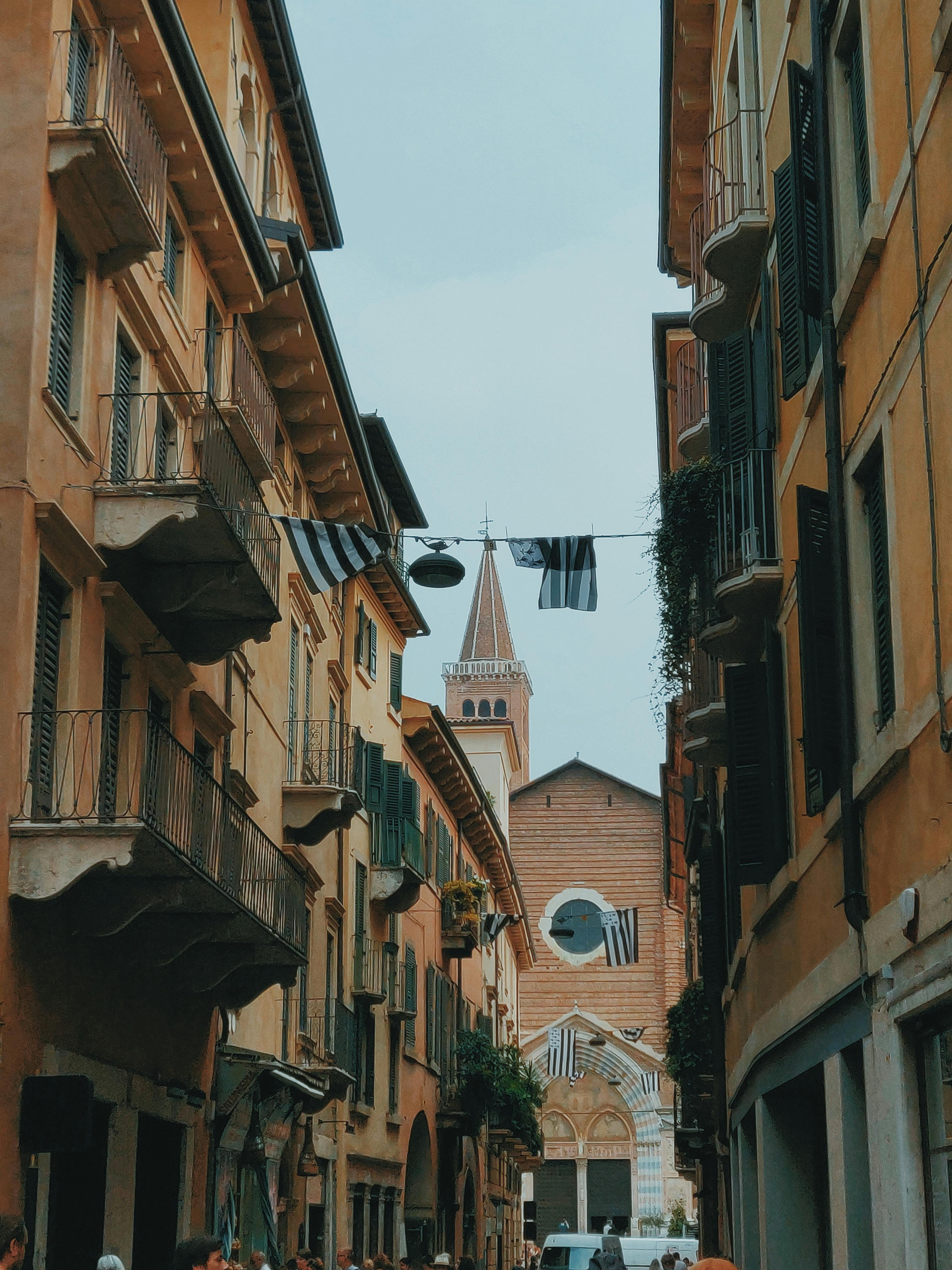 brown painted buildings under white sky