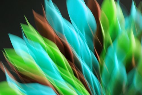 Free Abstract image showcasing vibrant color motion blur in greens and blues for artistic effect. Stock Photo
