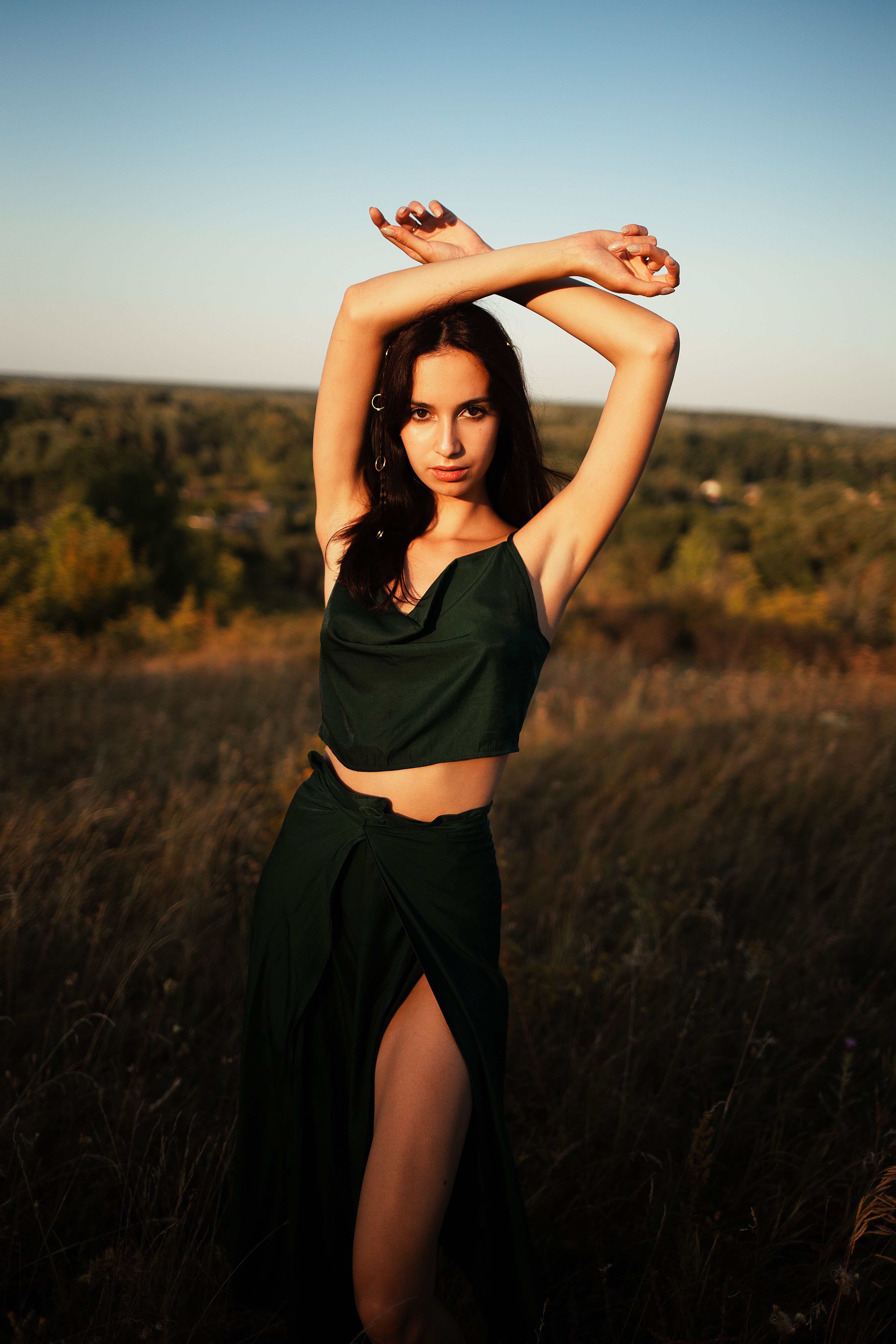 Portrait of Woman in Green Dress in Sunset Field · Free Stock Photo