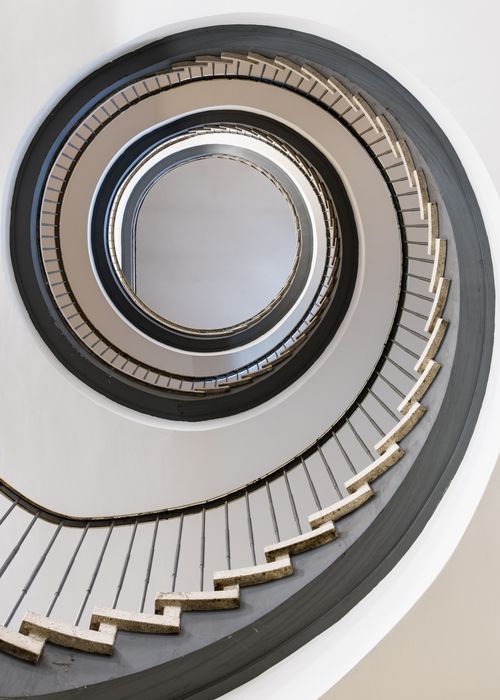 Free Abstract view of a spiral staircase in Hamburg, showcasing architectural geometry. Stock Photo