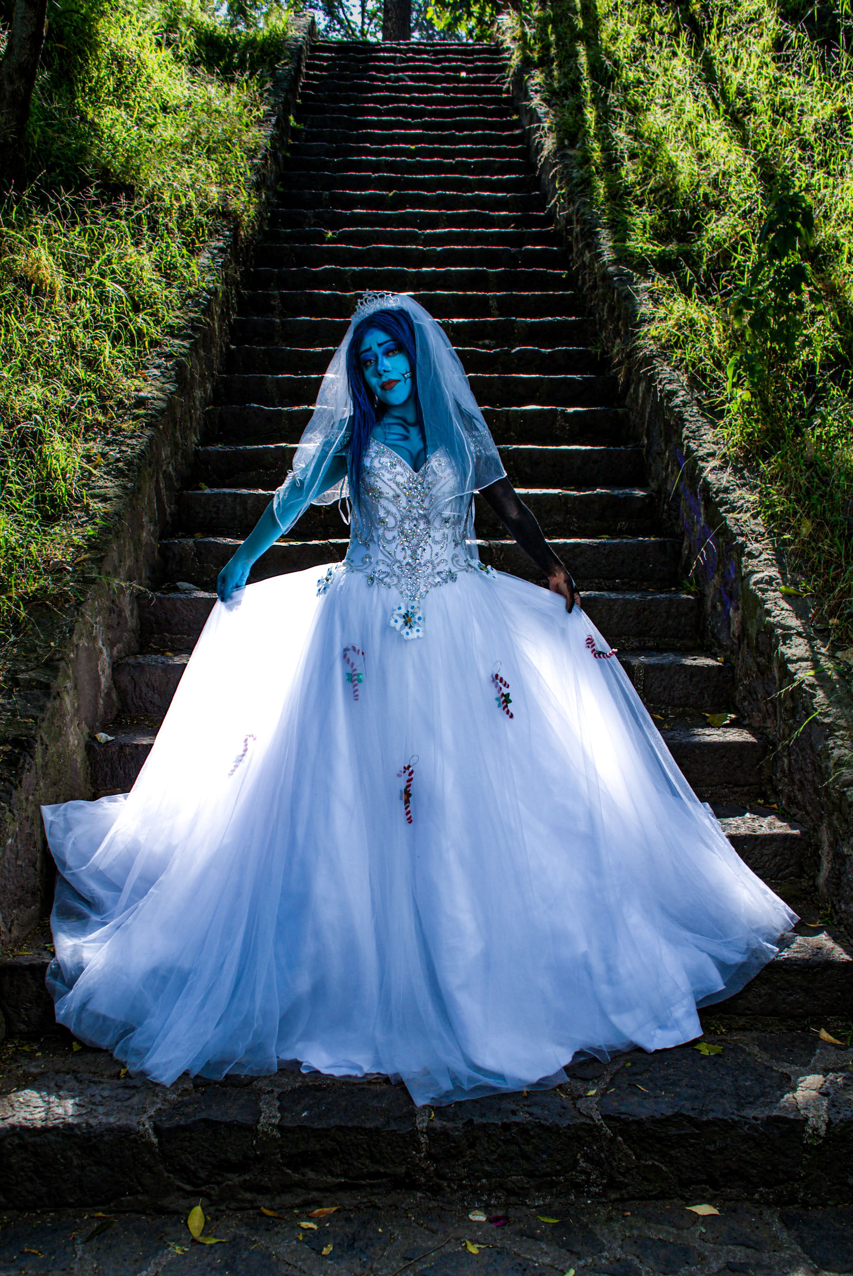 Ethereal Blue Woman in Bridal Gown on Stone Staircase  Free Stock Photo