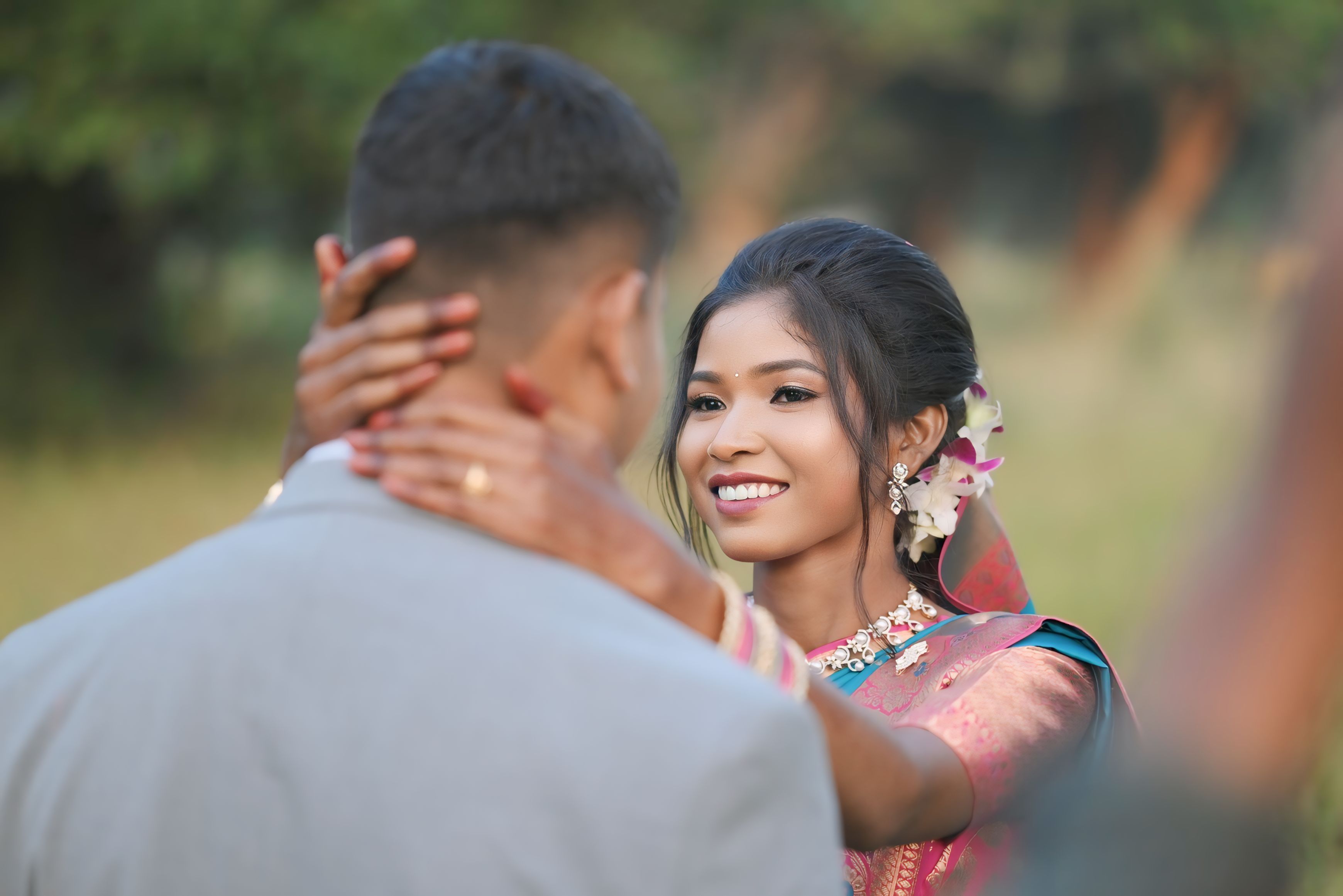 Romantic Couple Embracing in Indian Attire Outdoors · Free Stock Photo