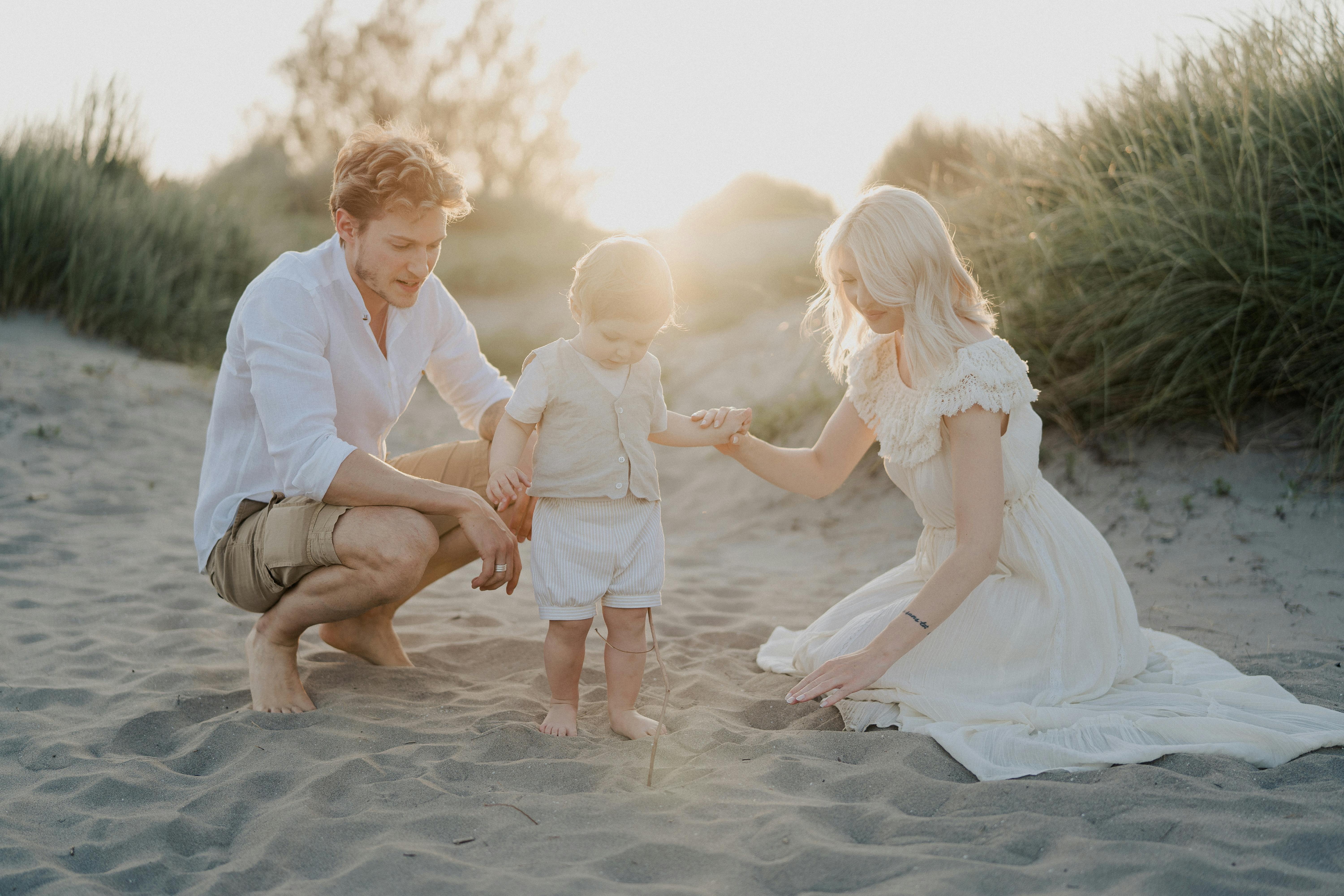 family bonding on a sunlit sandy beach