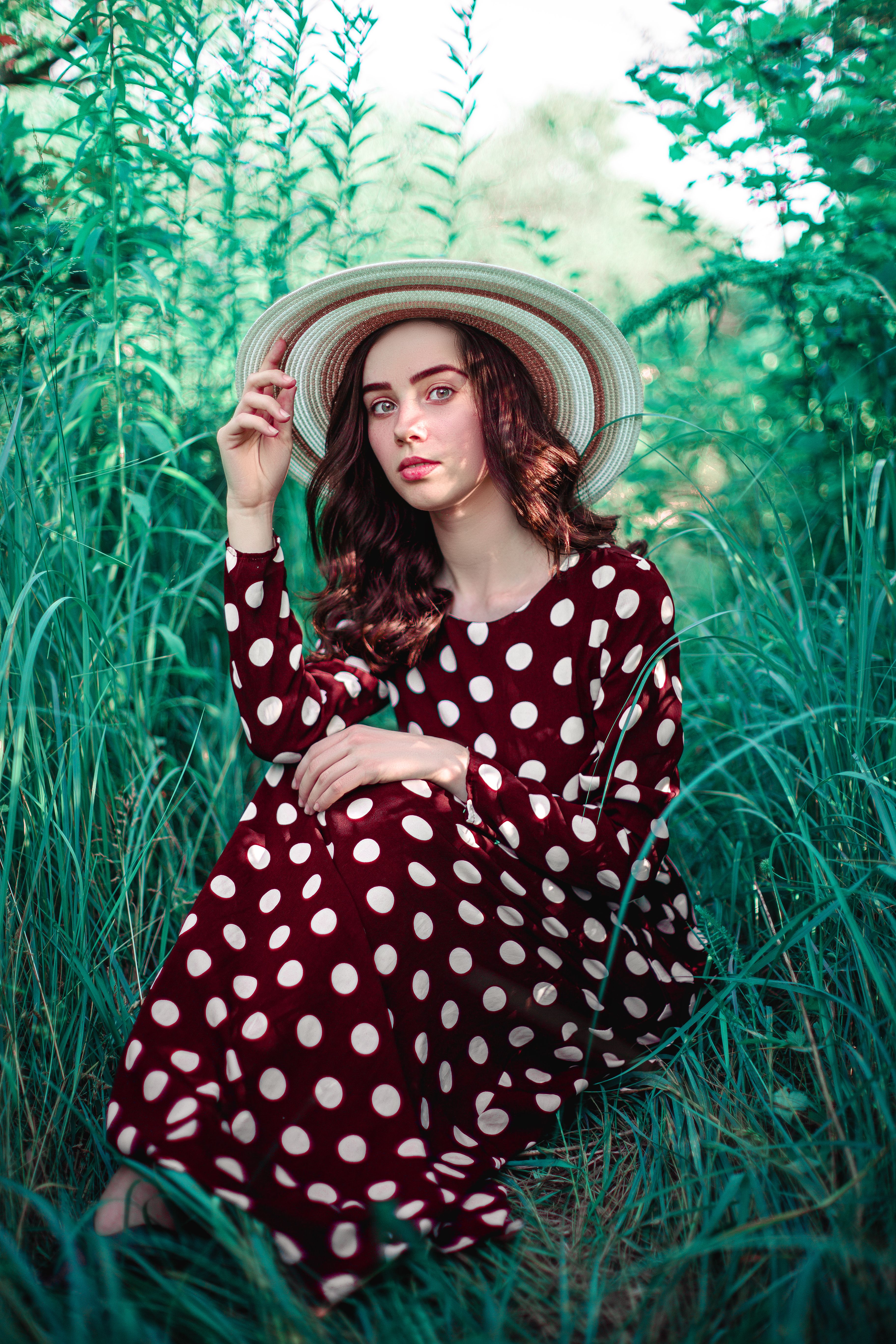 Woman in a polka-dot tea dress with heels