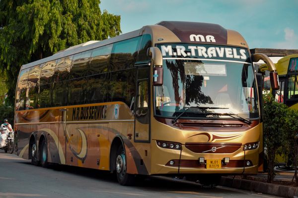 Luxury tour bus parked on street