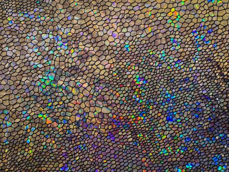 Vibrant abstract mosaic pattern with iridescent colors and hexagonal shapes. — photo by Magda Ehlers