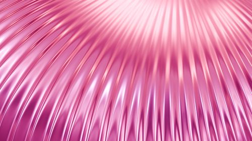 Free Vibrant pink metallic abstract design with fluid lines and geometric patterns. Stock Photo