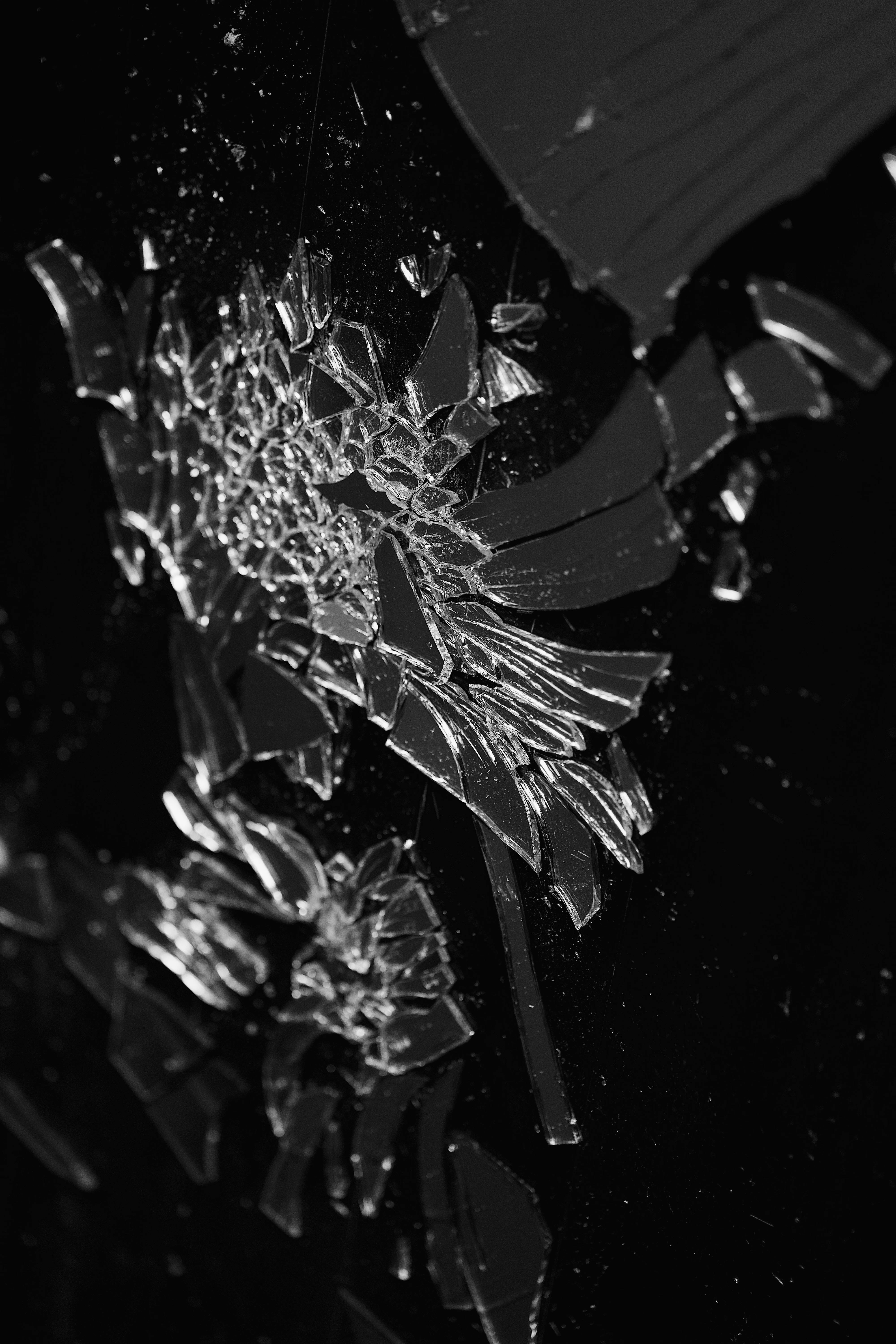 Abstract Broken Glass Shard Pattern on Black · Free Stock Photo