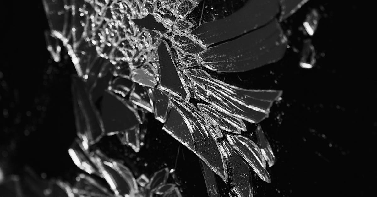 Abstract Broken Glass Shard Pattern on Black · Free Stock Photo