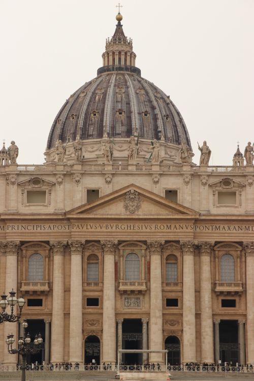 Free Close-up of the iconic dome of St. Peter's Basilica in Vatican City, showcasing its architectural grandeur. Stock Photo