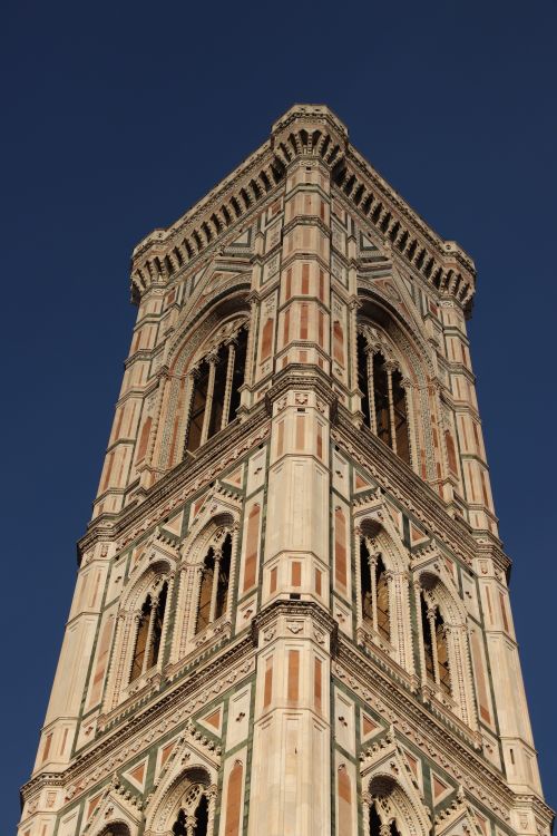 Free Close-up of Giotto's Campanile against a clear blue sky in Florence, Italy. Stock Photo