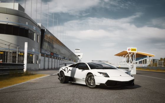 Sleek white Lamborghini Murcielago on a sunny day at a race track, showcasing luxury and speed.