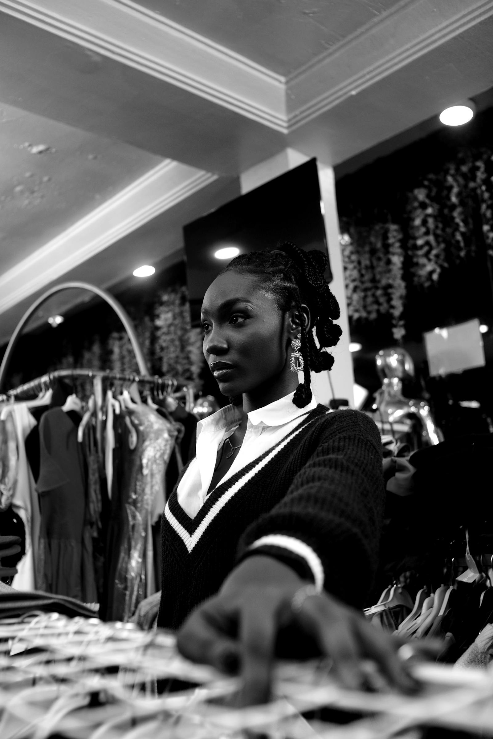 Black woman shopping inside a boutique