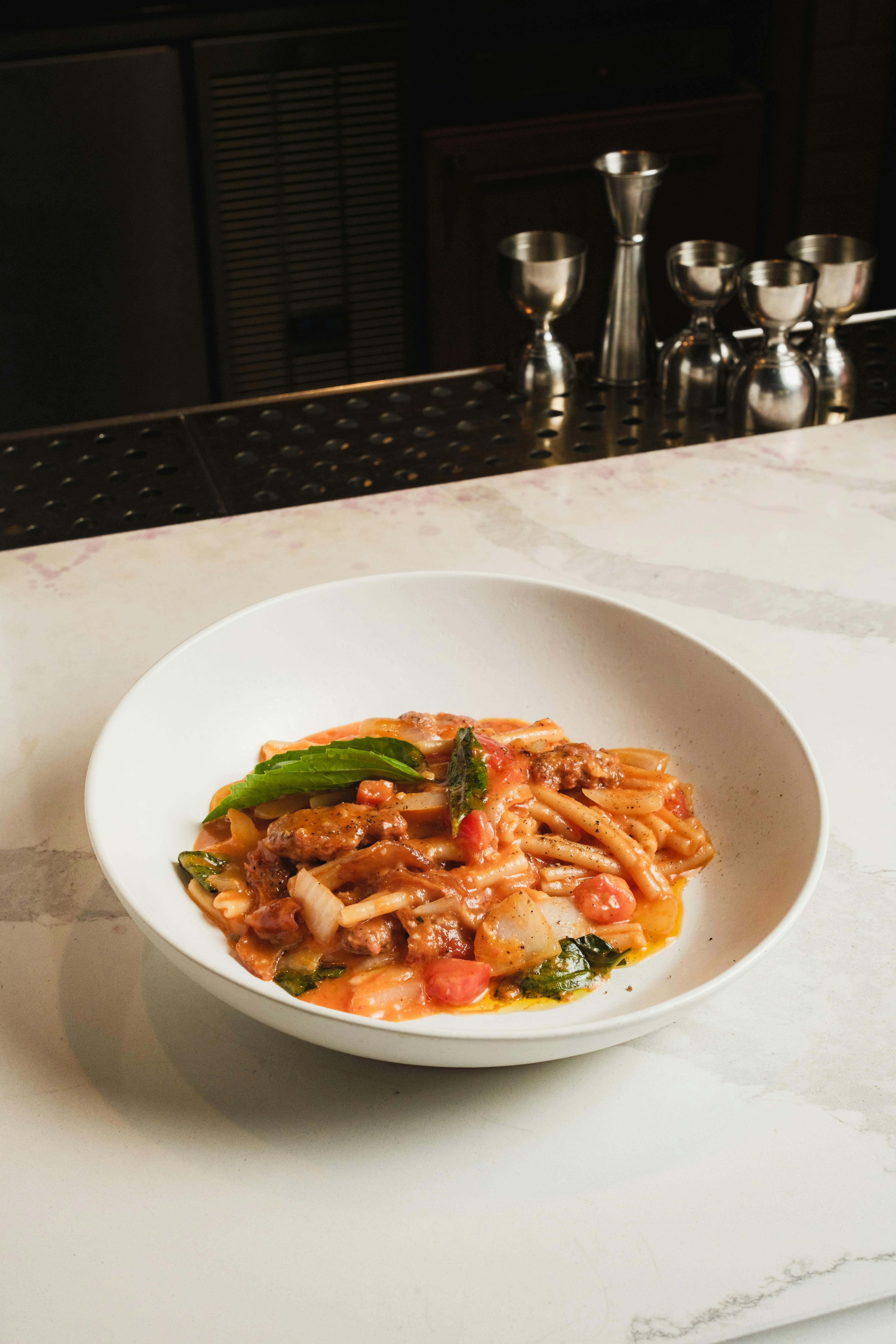 delicious meat pasta dish on marble counter