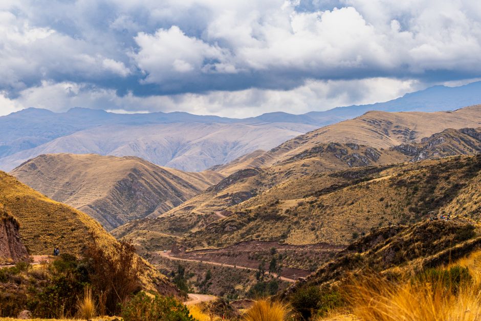 Breathtaking 2-Day All Inclusive Guided Jungle Tour from Iquitos at Maniti Eco-Lodge Review 2026 - Scenic view of rolling Andean mountains under dramatic clouds in Peru.